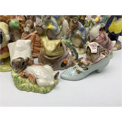 Sixteen Royal Albert Beatrix Potter figures, including Poorly Peter Rabbit, Jemima Puddle Duck and Squirrel Nutkin etc, all boxed together with a Beswick Beatrix Potter Jeremy Fisher miniature jug and four Beswick Wind in the Willows figures 