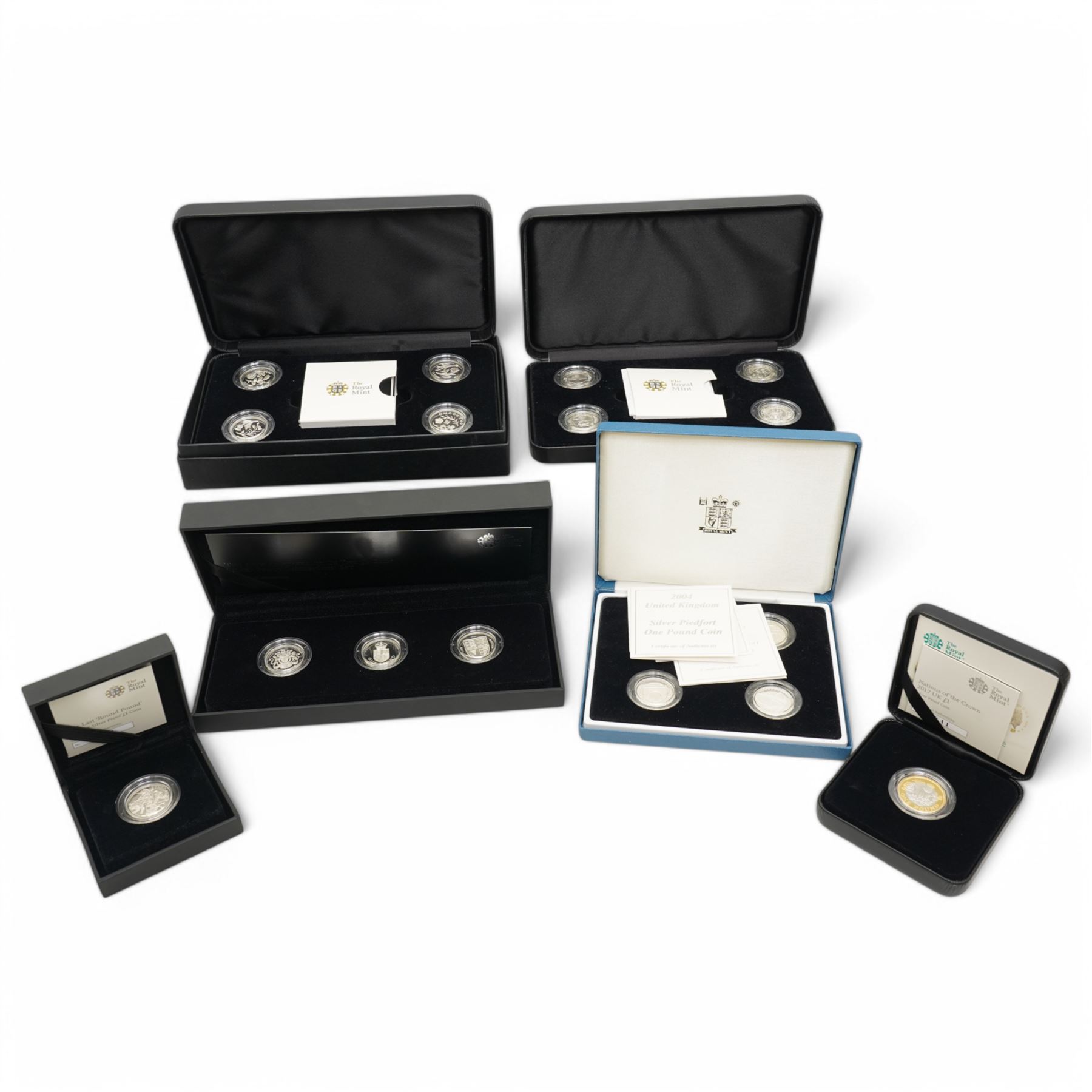Six The Royal Mint United Kingdom silver proof one pound coins or sets, comprising 2004, 2005, 2006, 2007 'Bridges' four-coin set, 2010 and 2011 'Cities' four-coin set, 2013 'The 30th Anniversary Of The £1 Coin' three-coin set, 2013 and 2014 'Floral' four-coin set, 2016 'The Last Round Pound' and 2017 'Nations of the Crown', all cased with certificates