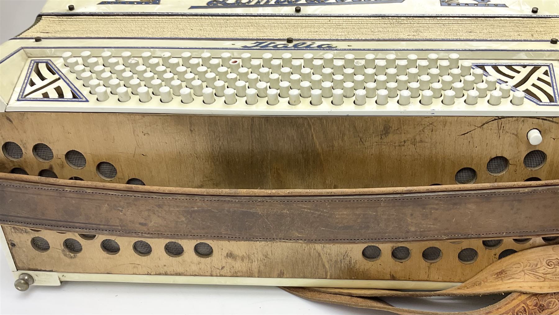 Italian Lambardi piano accordion in ivory coloured pearline case with jewelled decoration, twenty keys and one-hundred and twenty buttons L 37cm
