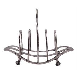 Late Victorian silver toast rack, the base of curved serpentine form supporting five curved bars with central ring handle, upon four claw feet, hallmarked Mappin Brothers, Sheffield 1900, H9cm L13cm, approximate weight 3.62 ozt (112.5 grams)