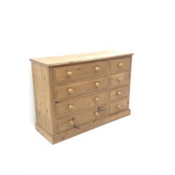 Polished pine chest of drawers, Projecting cornice, four long and four short drawers, platform support