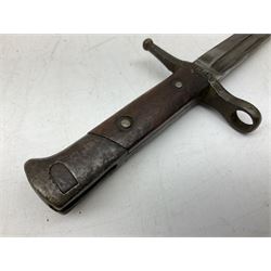Italian Model 1891 Carcano knife bayonet with 30cm fullered steel blade, the cross-piece stamped VL1110; in steel scabbard with webbing frog L43cm overall; and another Italian fighting knife/bayonet in brass bound leather scabbard (2)