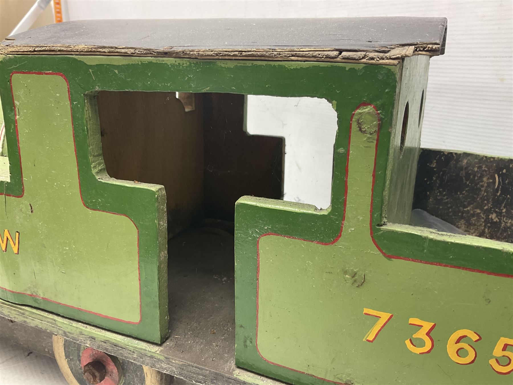 1960s scratch-built green, black and red painted wooden model of a 4-6-0 tank locomotive 'Andrew' No.7365 L88cm; and an unused wall mounting die-cast model display cabinet with glass door and shelves 52 x 40cm (2)