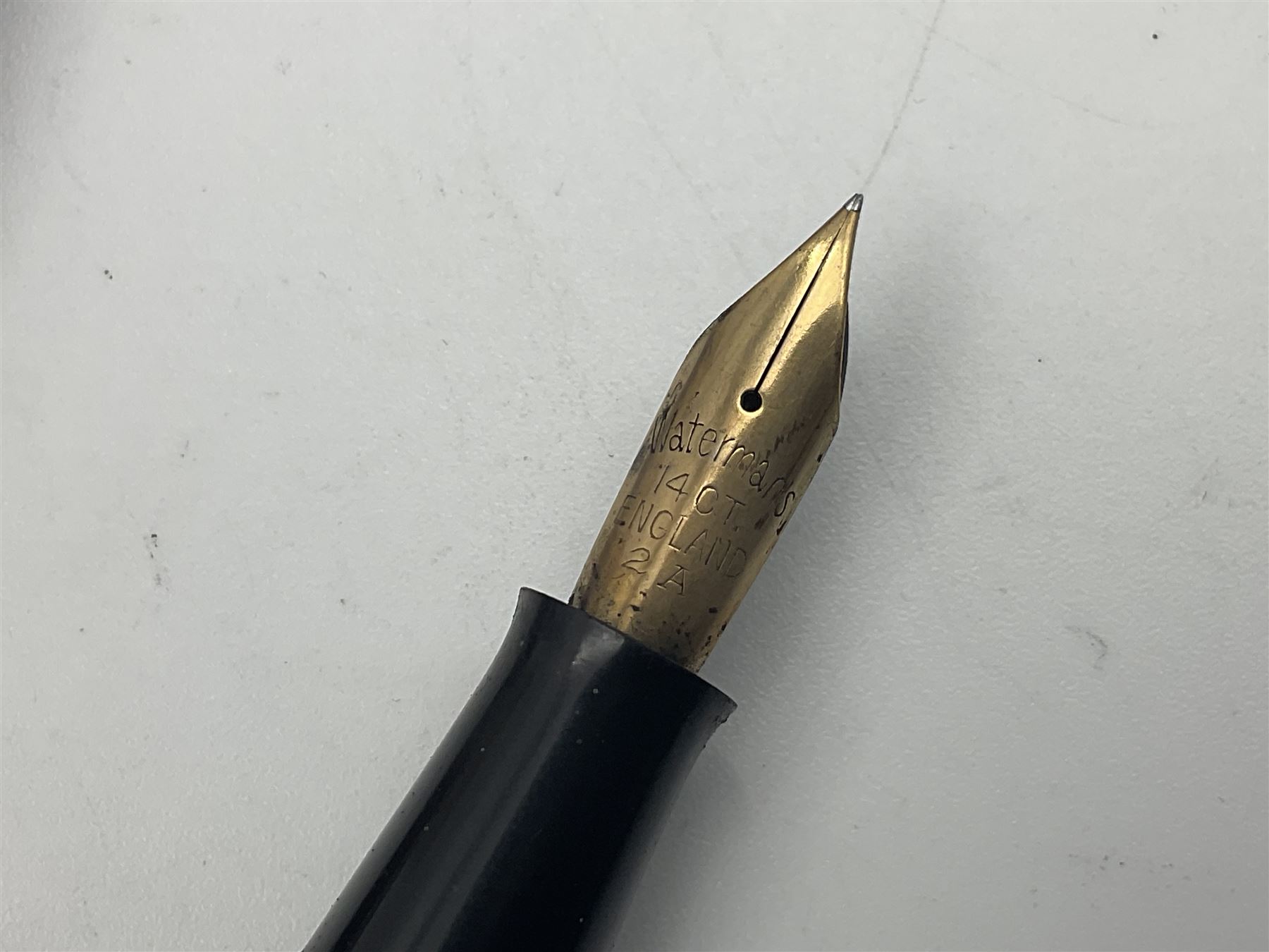 Group of Waterman pens and propelling pencils, to include a fountain pen, the black barrel with rolled gold cap and nib stamped 14ct, together with a matching propelling pencil, in box, together with a further fountain pen with gold nib stamped 14ct, stainless steel fountain pen and rollerball set in box, propelling pencil with maroon barrel etc, largest L13cm (7)