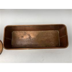 Victorian copper hot water urn, the body of plain cylindrical form with brass tap, the slightly domed lid with brass finial, together with a rectangular copper planter, with twin brass lion mask handles, urn H35cm