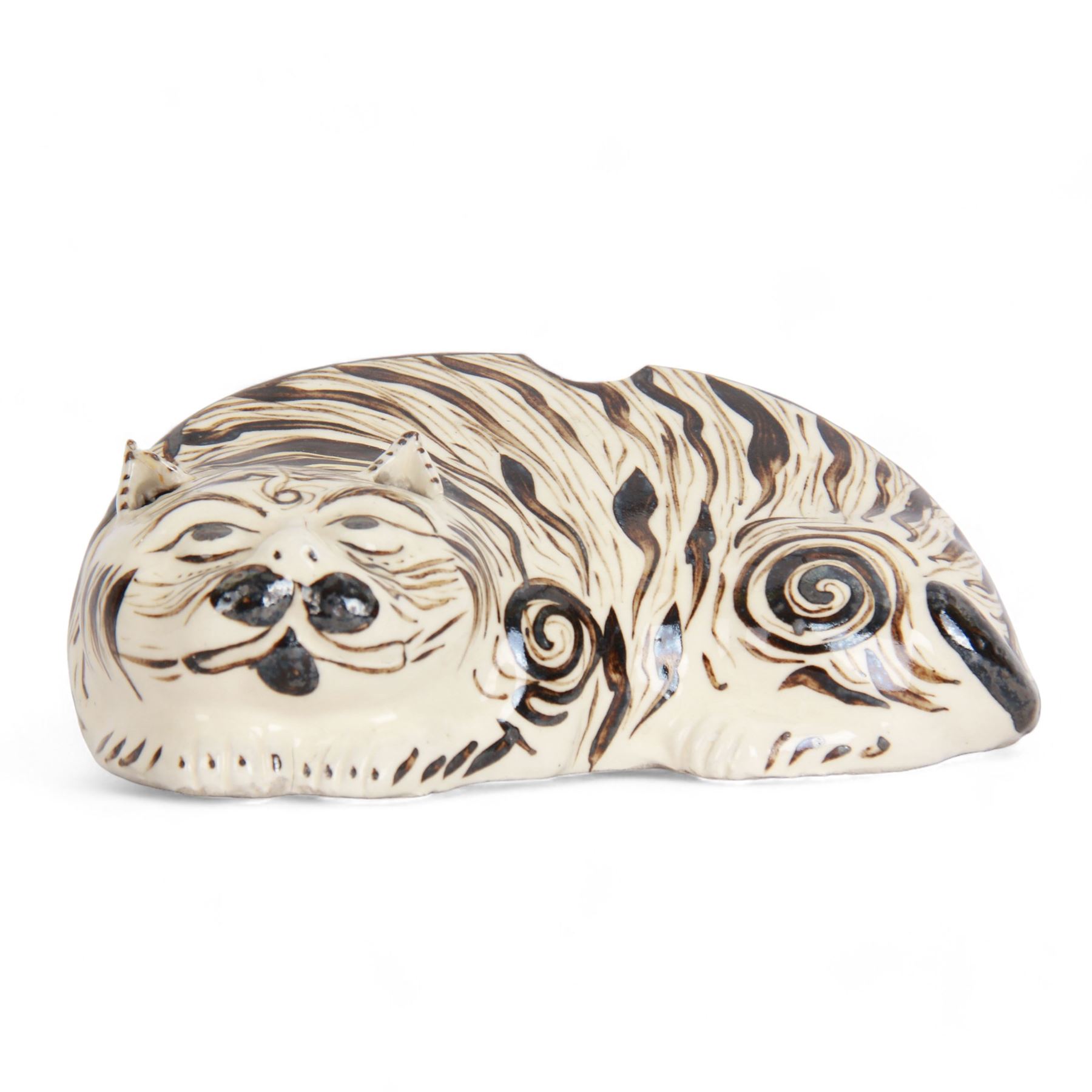 19th century Chinese Cuzhou style glazed pottery model of a cat, modelled in a lying position, and decorated with brown markings upon a cream ground, with opening to back and both ears possibly for incense, H8.5cm L23cm
