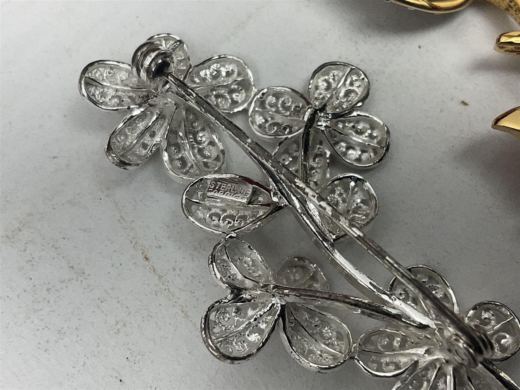 Maurice Lacroix gentlemans quartz wristwatch, 92127, with gold plated case, date apeture and leather strap, together with a Swarovski Crystal bracelet, two silver brooches and two costume brooches