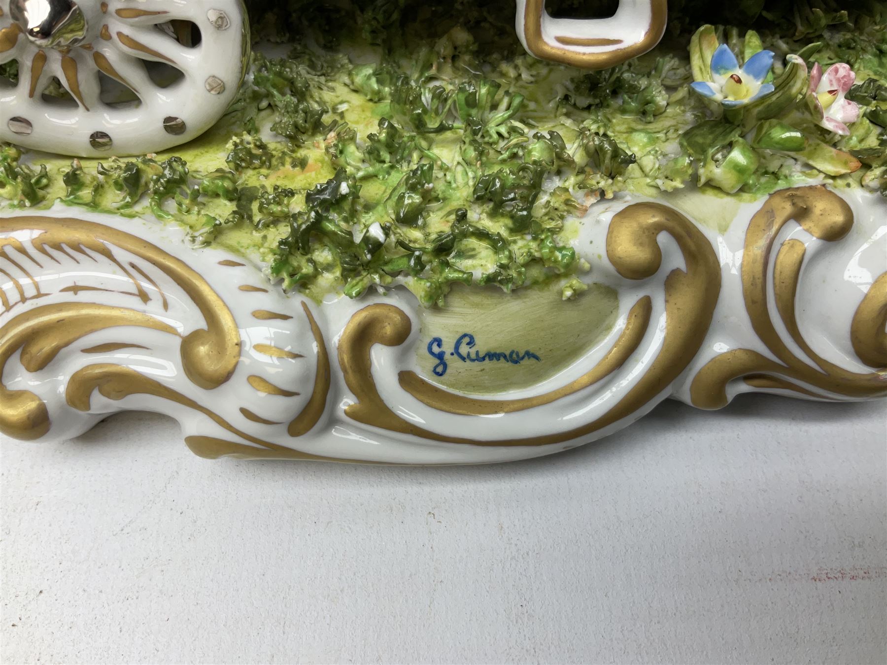 Capodimonte figure group of a horse drawn carriage with two horses pulling an open carriage with a male with dresden lace cuff and a female with full dresden lace skirt,  on a naturalistic base, H15.5cm