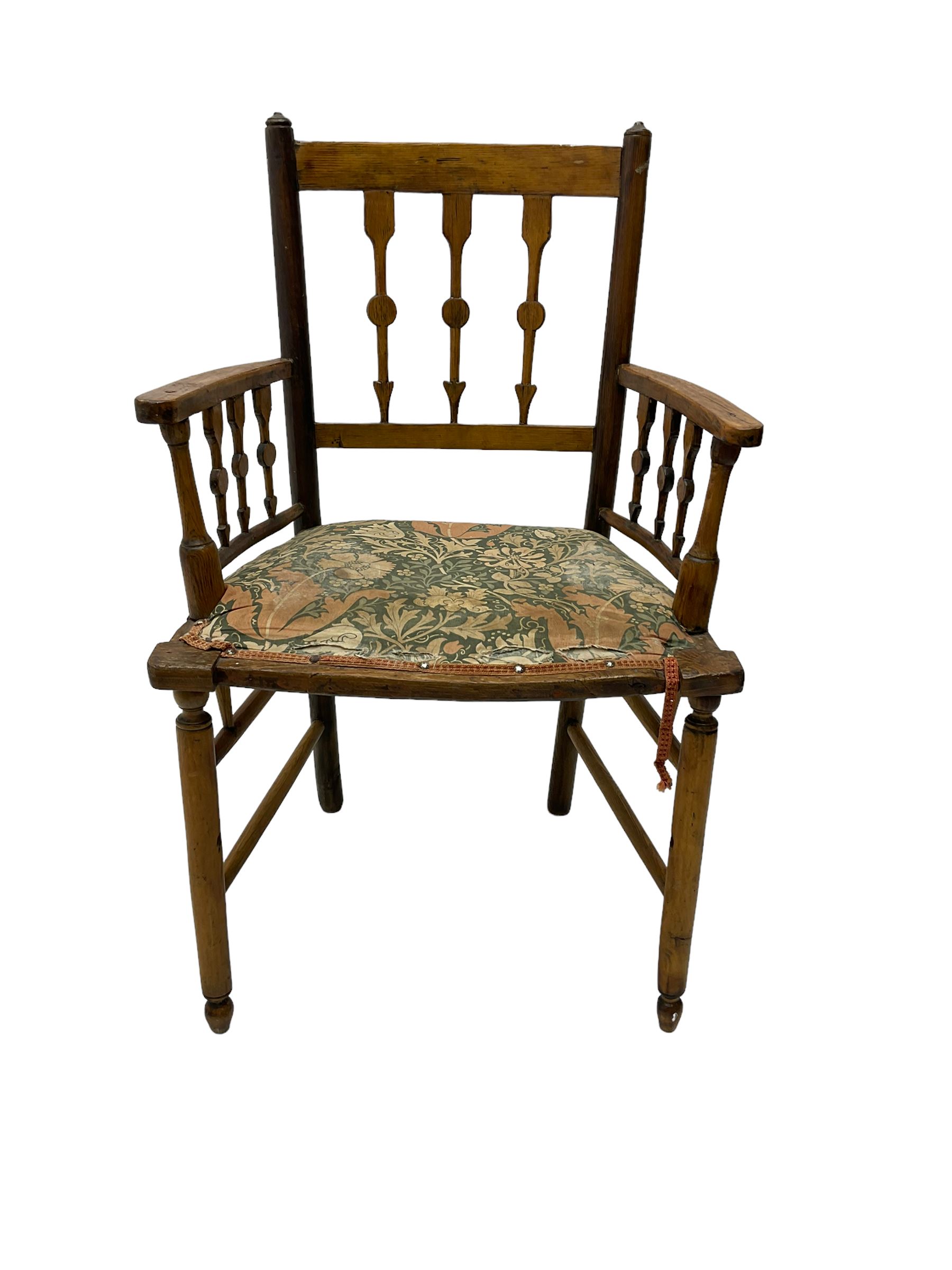 19th century ash and beech Sussex type elbow chair, the back and arms with arrow shaped vertical rails, upholstered seat, on turned supports