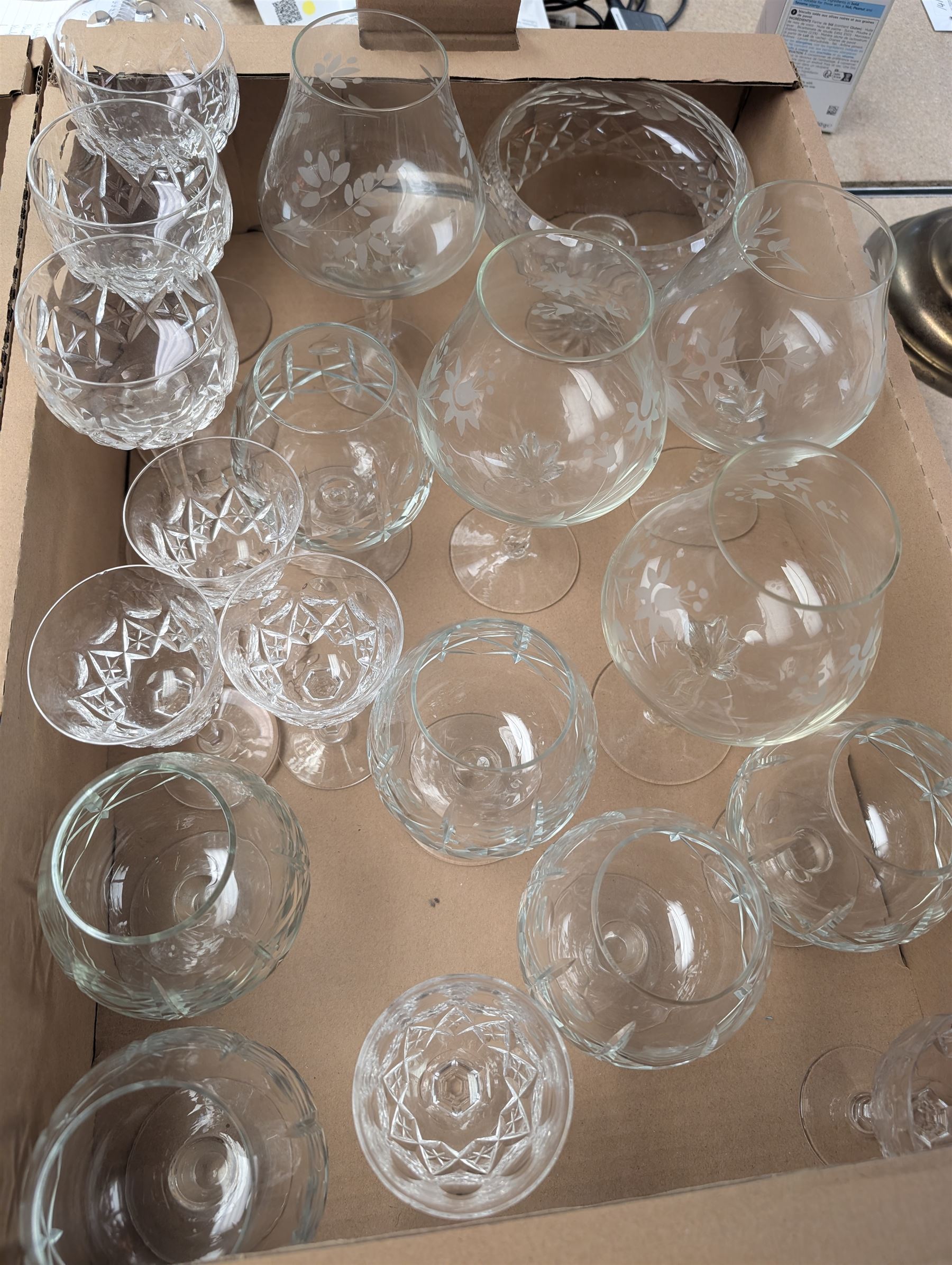 Collection of crystal and glassware, including pair of Stuart Crystal wine glasses, other Stuart Crystal glasses, etched balloon glasses and a collection of other glassware, in two boxes