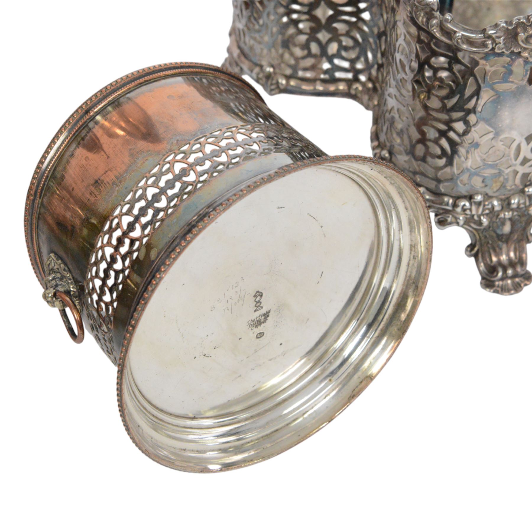 Silver plated twin handled bottle holder bottle, together with another bottle coaster and other plated items