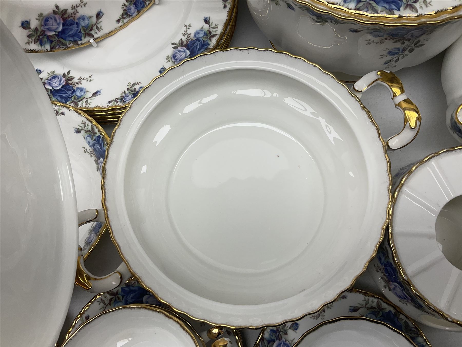Royal Albert Moonlight Rose pattern dinner service for six, to include, dinner plates, bowls, soup bowls, twin handled soup bowls with saucers, twelve side plates, twin handled soup tureen with cover, twin handled serving dish and cover, sauce boat and saucer, teapot and warmer etc (51)