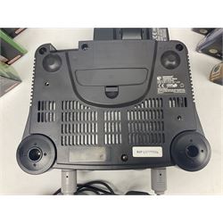 Nintendo 64 console, two controllers, games and accessories. Accessories to include the ‘Tremorpak’ and ‘Spook’ 2 Phono plugs and a S-VHS plug with adapter, both in original boxes. Games to include ‘Golden Eye 007’, ‘Doom 64’, ‘Killer Instinct Gold’, ‘Tetrisphere’, ‘F-1 World Grand Prix’, ‘Pilotwings 64’ and ‘Lylatwars’ with ‘Rumble Pak’, all with original boxes and instruction manuals. ‘Star Wars Episode I Racer’ game cartridge in Shadows of the Empire box. 