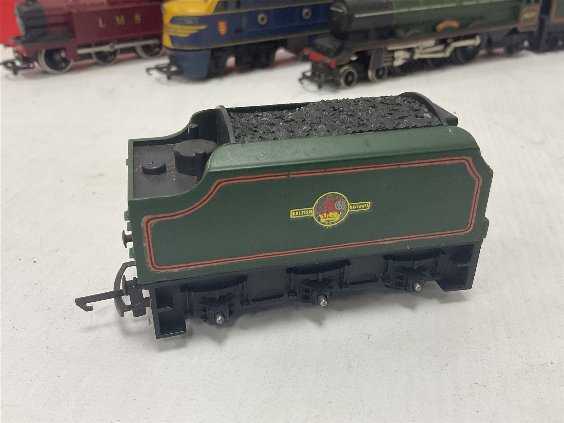 Hornby/Tri-Ang ‘00’ gauge - nine locomotives to include Britannia Class ‘Britannia’ 4-6-2 no.70000 in BR green; Class M7 4-4-0 Tank no.30027 in BR black; Princess Class ‘Princess Victoria’ 4-6-2 no.46205 in BR black; in original boxes; further loose models Princess Class ‘Princess Elizabeth’ 4-6-2 no.46201 in BR green; Class 3F 0-6-0 tank no.7606 in LMS crimson; TR double ended diesel locomotive; three further tank locomotives and one loose tender (10) 
