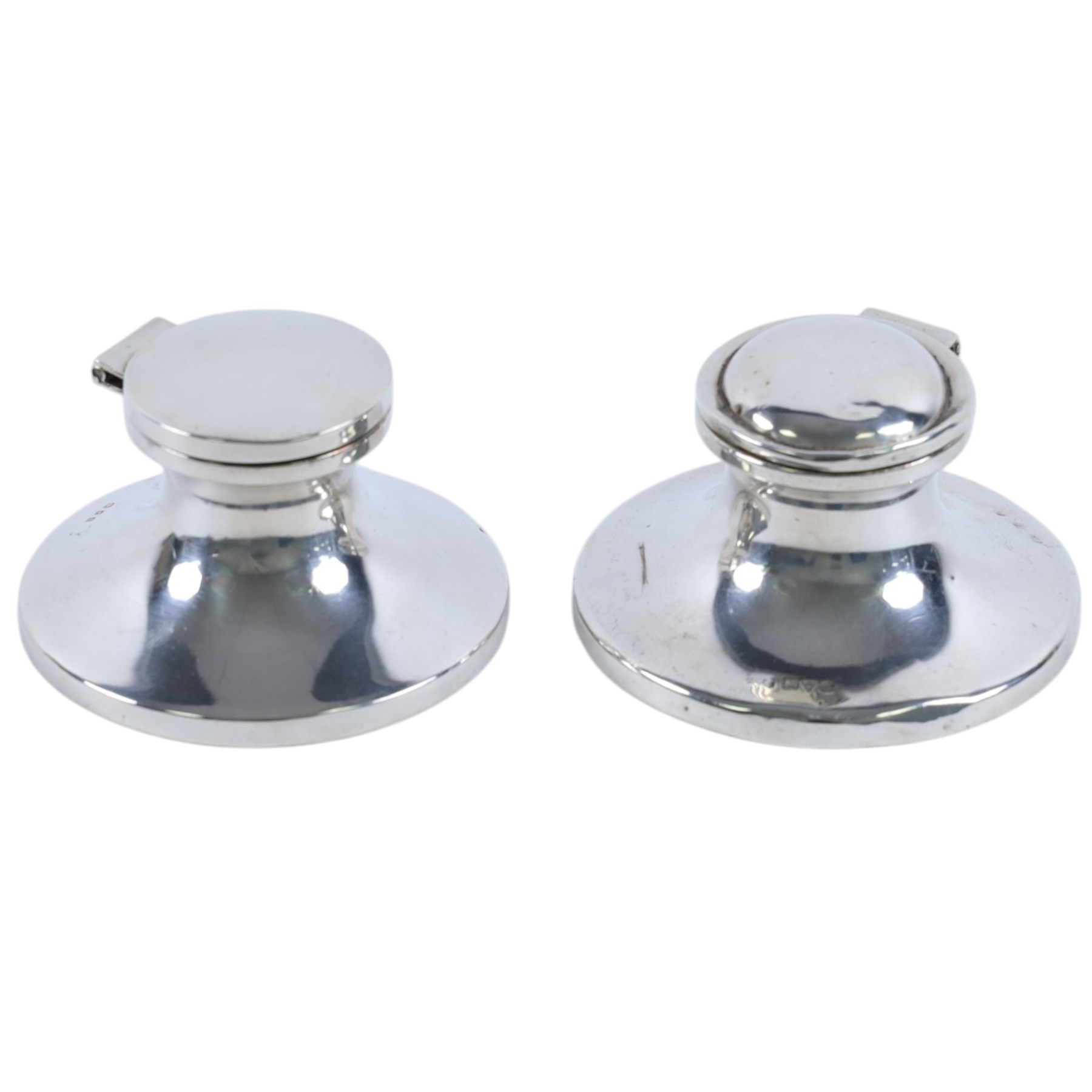 Pair of silver mounted capstan inkwells, both hallmarked
