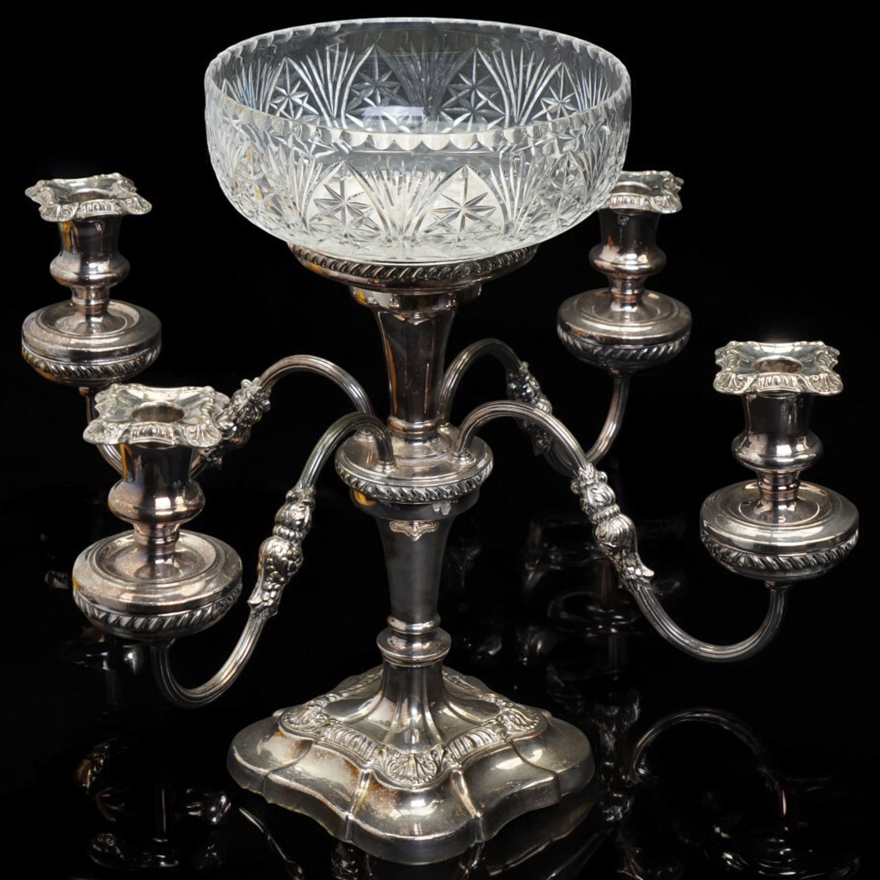 Silver plated four branch centrepiece set with glass bowls and a larger centre bowl and with interchangeable candle sconces H37cm  and a plated punch bowl with lion mask handles D37cm (2)