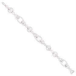Art Deco platinum diamond bracelet, circa 1920, articulated openwork circular and geometri...