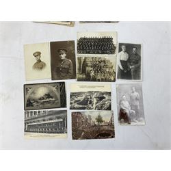 Twenty-two WW1 real photographic postcards of soldiers including portraits, group shots, Range Training etc; quantity of other WW1 postcards predominantly showing French bomb damage; five WW1 stereoscopic cards including George V visit to Hull munitions factory; W.C. Oates book on The Sherwood Foresters in the Great War; and Hull City Council WW1 Peace Commemorative Book