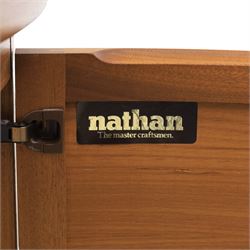 Nathan - 'Squares' corner cabinet, the upper section enclosed by two curved glazed doors with glass shelves, over a shaped base fitted with a single frieze drawer and panelled twin cupboard doors