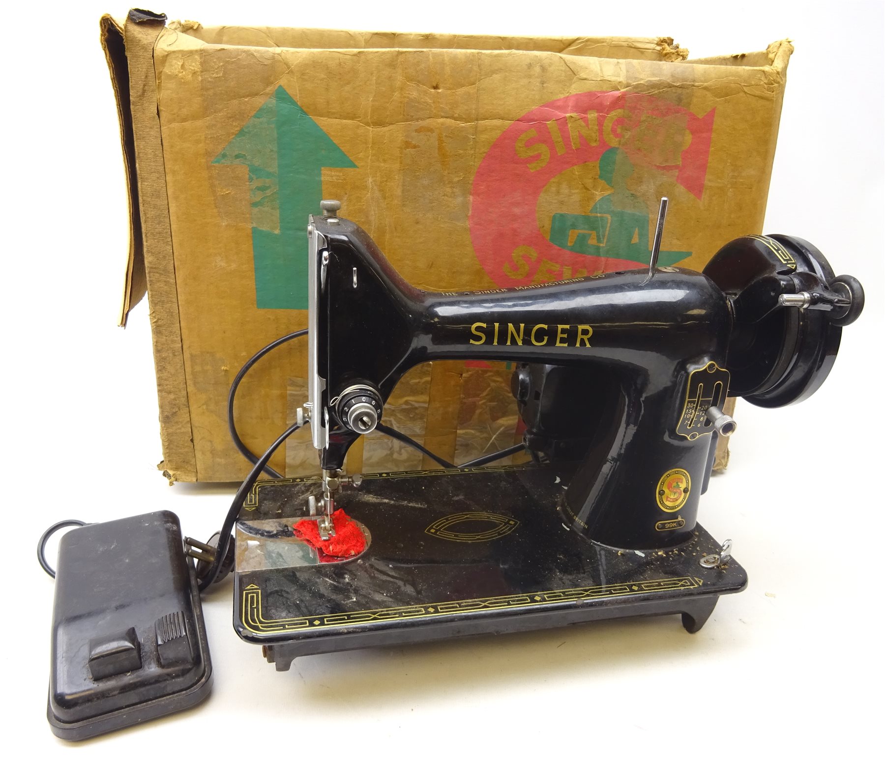 Singer Sewing Machine, model 99K, with some attachments, foot pedal and