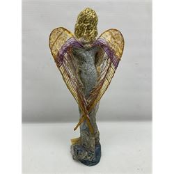 Anna Meszaros Hungary - hand made needlework figurine of an Angel with metallic lace full length dress and open threadwork wings; on moulded base H45cm Auctioneer's Note: Anna Meszaros came to England from her native Hungary in 1959 to marry an English businessman she met while demonstrating her art at the 1958 Brussels Exhibition. Shortly before she left for England she was awarded the title of Folk Artist Master by the Hungarian Government. Anna was a gifted painter of mainly portraits and sculptress before starting to make her figurines which are completely hand made and unique, each with a character and expression of its own. The hands, feet and face are sculptured by layering the material and pulling the features into place with needle and thread. She died in Hull in 1998.