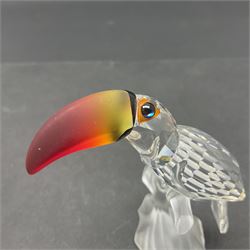 Three Swarovski Crystal bird figures, comprising Toucan, pair of puffins and pair of parrots on a branch, tallest H10cm