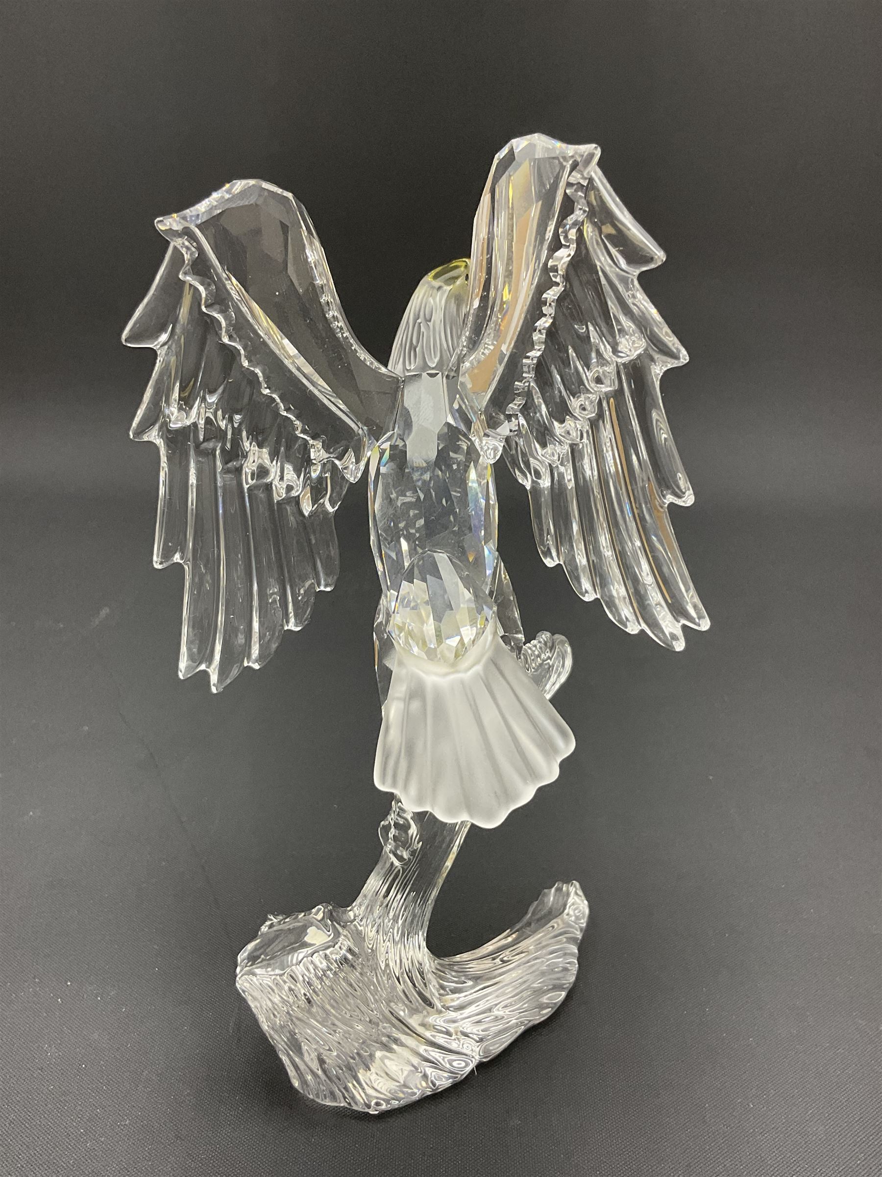 Swarovski Crystal animals, comprising white peacock, the tail with cascading blue flowers, perched eagle with yellow beak, ibex with frosted crystal horns and unicorn with frosted crystal horn, tallest H13cm