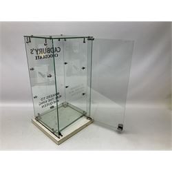 Cadbury's chocolate countertop display advertising cabinet, glazed with 'Cadbury's Makers to T.M The King & Queen', with two glass shelves and a back opening door, H54,5cm