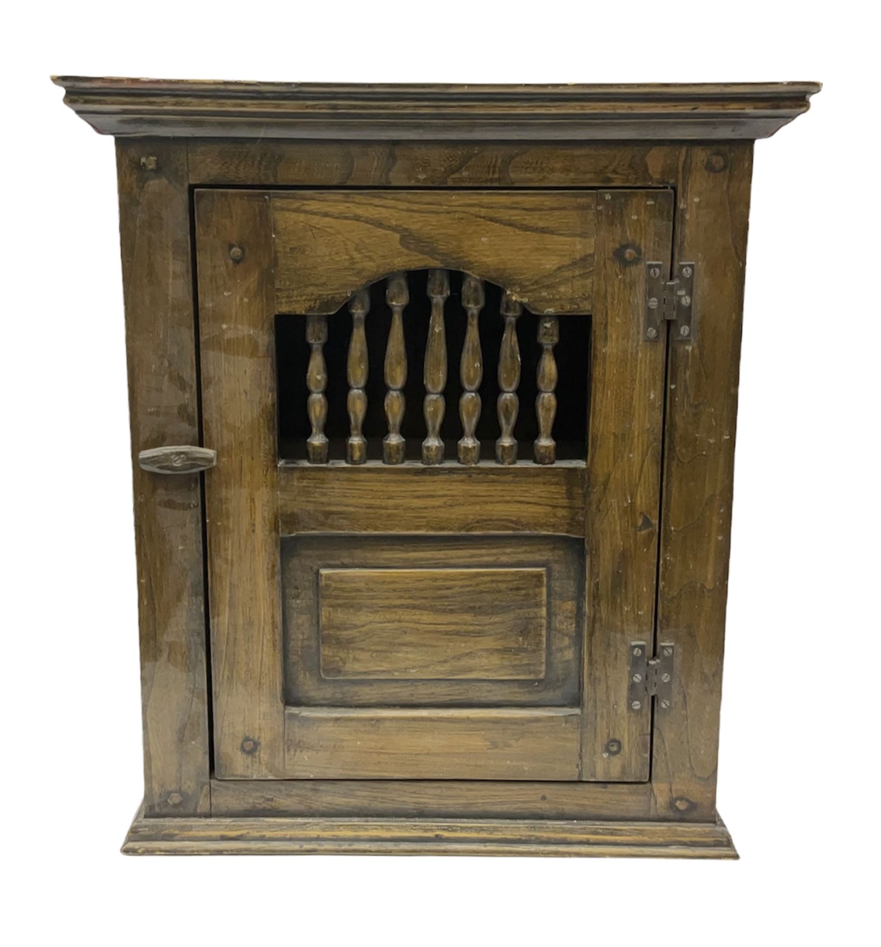Oak dole cupboard / food hutch, the hinged panelled door with turned spindles enclosing a single shelf interior, H52cm D17cm W46cm
