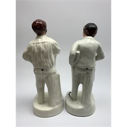 A pair of Staffordshire figures, The Newspaper Seller, and Shoe Shine Boy, H31cm