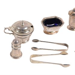Collection of silver cruet items and flatware, including miniature muffineer, two pairs of sugar tongs, mustard pot and cover, open salts and pepper shaker, all hallmarked