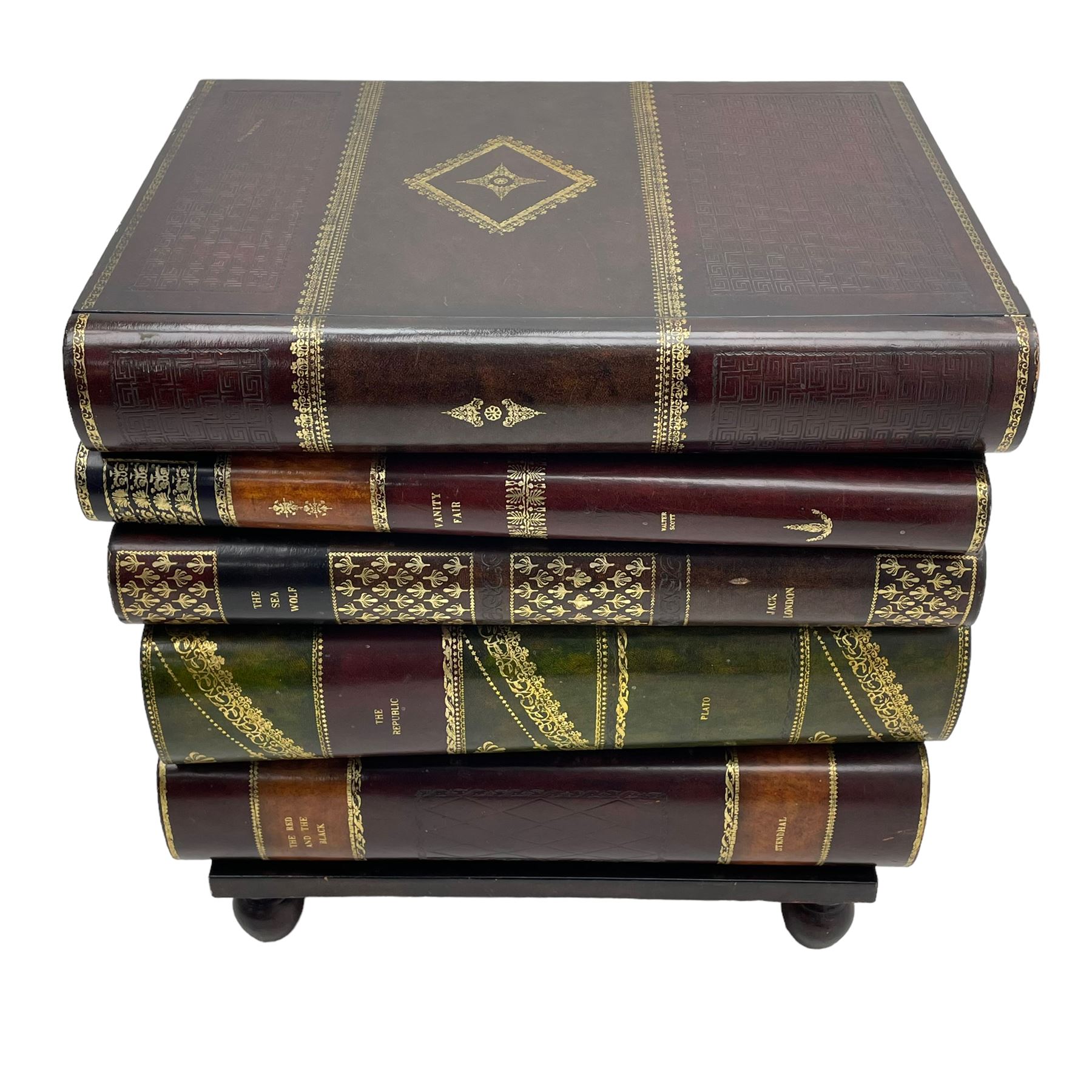 Maitland-Smith - four drawer chest in the form of a stack of leather-bound books, the top drawer with metal label inscribed 'Maitland-Smith', on turned feet