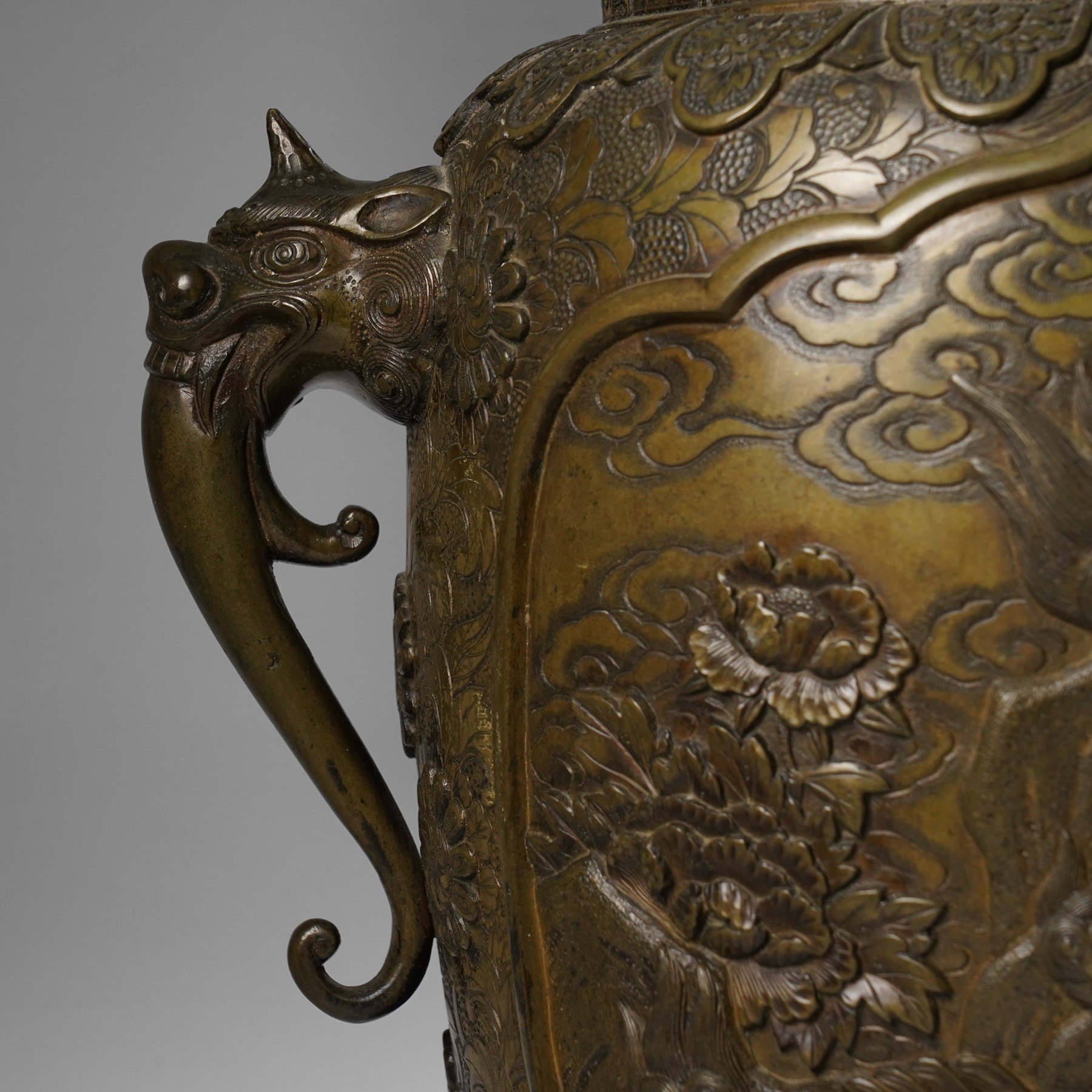 Japanese Meiji-Taisho period bronze vase, by Kanaya Gorosaburo, decorated with dragons and other creatures in a landscape, seal mark to base, H35.5cm 