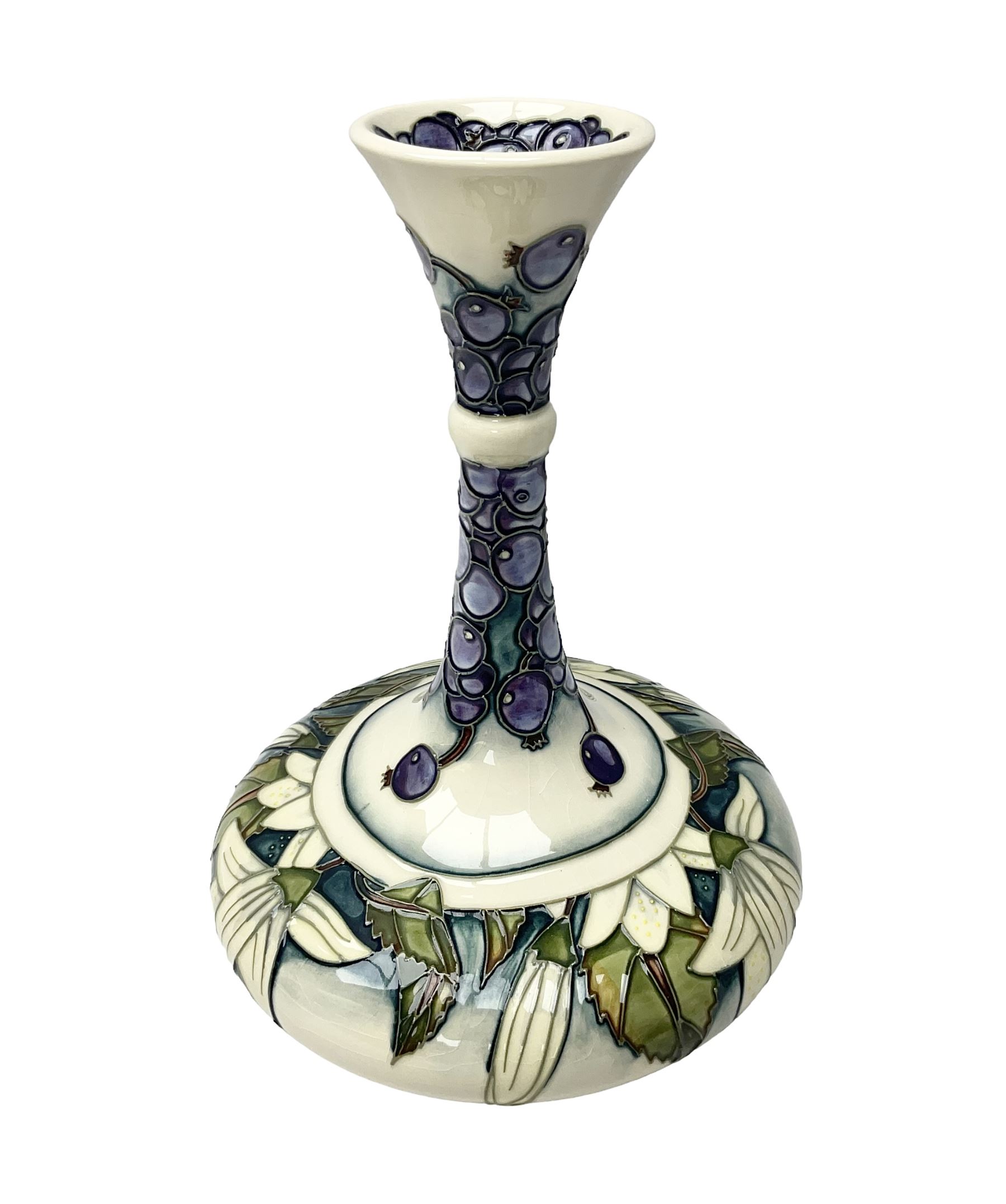 Moorcroft vase, of compressed form with a tall flared neck, decorated in the Juneberry pattern, circa 2000, H25cm