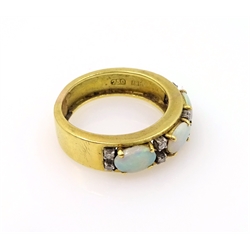 Opal and diamond gold ring, three opals and eight diamonds, stamped 18k 750 approx 7.1gm  