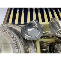 Collection of silver plate, including serving dishes, coasters and a large quantity of flatware