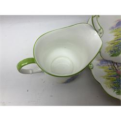 Aynsley Bluebell Time 'As Supplied to the Queen' tea service, comprising hot water jug, six teacups and saucers, milk jug, two cake plates and tow trinket dishes  