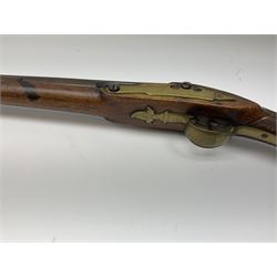 Early 19th century 15-bore flintlock converted to percussion cap fowling piece, the lock stamped T. Richards, walnut half stock with brass fittings including trigger guard with pineapple finial and 91cm barrel with ramrod under L129cm overall