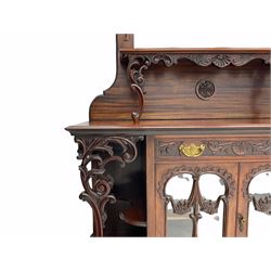 Late Victorian Empire style walnut mirror back sideboard, two glazed centre cupboards with drawer drawer