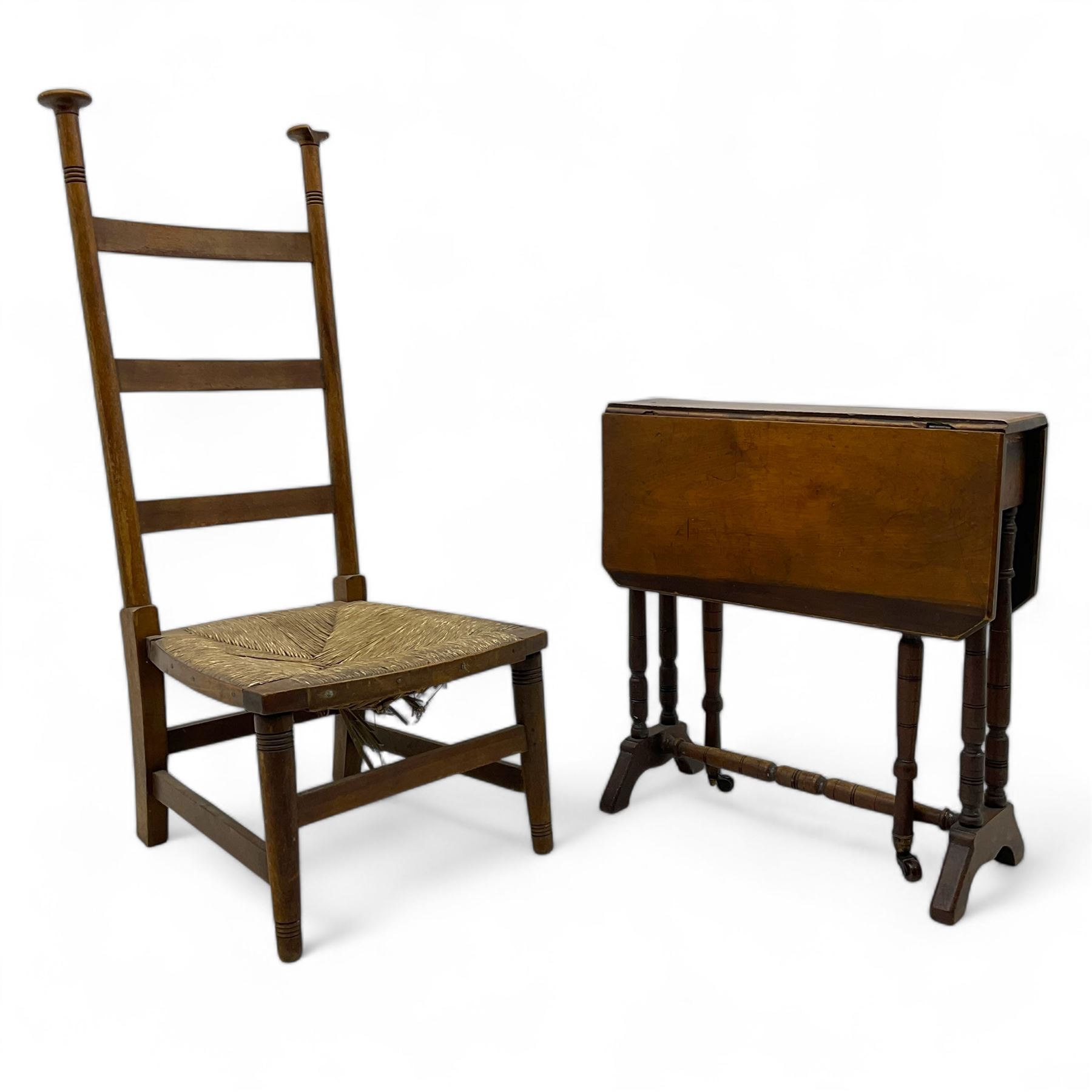 Attributed to William Birch of High Wycombe - Arts & Crafts oak ladder-back side chair, with turned finials, rush seat, and stretchers, raised on square-section supports; 19th century mahogany Pembroke table, rectangular drop-leaf top raised on turned supports with central stretcher and splayed feet