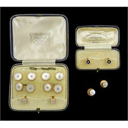 Early 20th century rose gold mother of pearl cufflink and shirt stud set, stamped 9ct, two gold black enamel and seed pearl studs stamped 18ct & Pt, both boxed, and two other 9ct gold studs