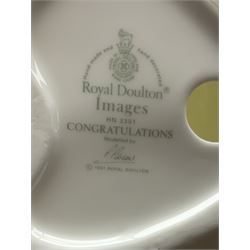 Four Royal Doulton Images figures comprising 'Happy Anniversary', 'Wedding Day', 'Congratulations' and 'Carefree', together with a set of three Heinrich collectors plates depicting Fairies.