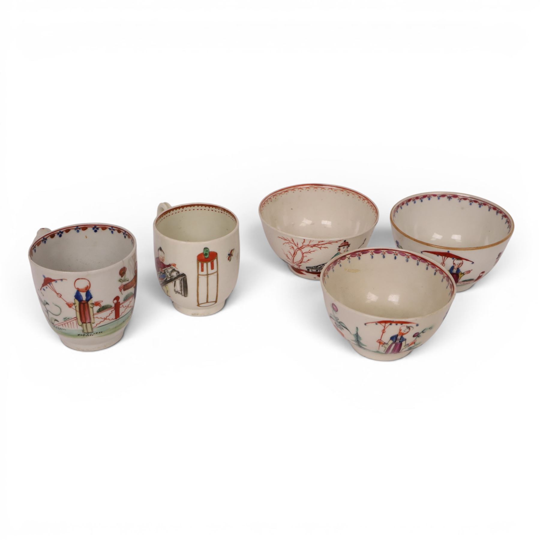 18th/ 19th century chinoiserie decorated porcelain including two New Hall tea bowls and a coffee cup in Boy and the Windmill pattern, Worcester Mandarin coffee cup and Liverpool tea bowl 