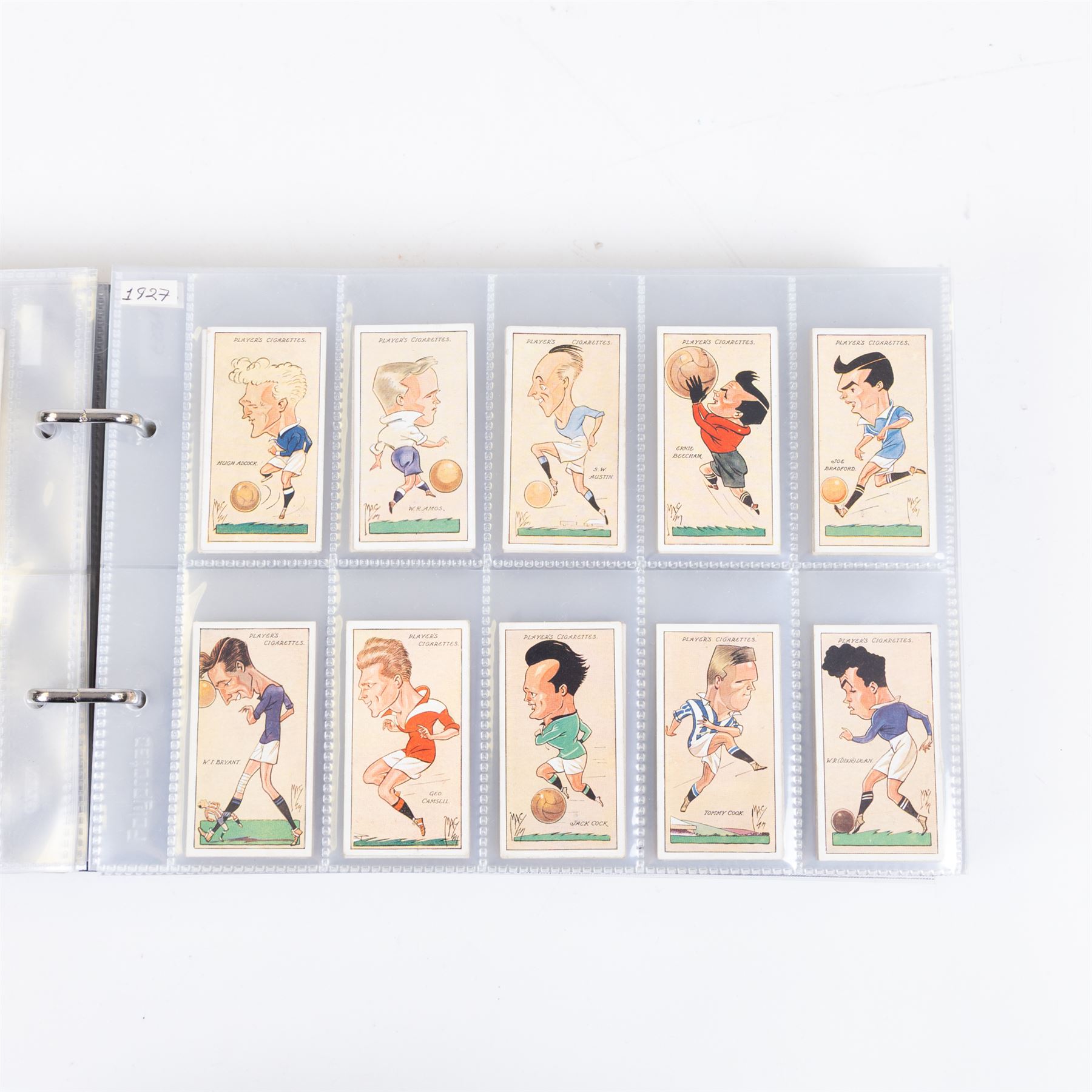 Collection of Edwardian and later Football related trading and cigarette cards, including forty-nine of fifty 1906 Ogden's Football Club Colours, 1922 PALS Footall series, ninety of one hundred 1925 Gallaher Famous Footballers, complete set of forty-four 1926 Ogden's Captains of Association Football Clubs and Colours, complete set of fifty 1927 Players Football Caricatures by MAC,  complete set of fifty 1927 Players Football Caricatures by RIP,  complete set of fifty 1930 Players Association Cup Winners, complete set of 50 1933 Ogdens AFC Nicknames etc, housed in brown cigarette card album