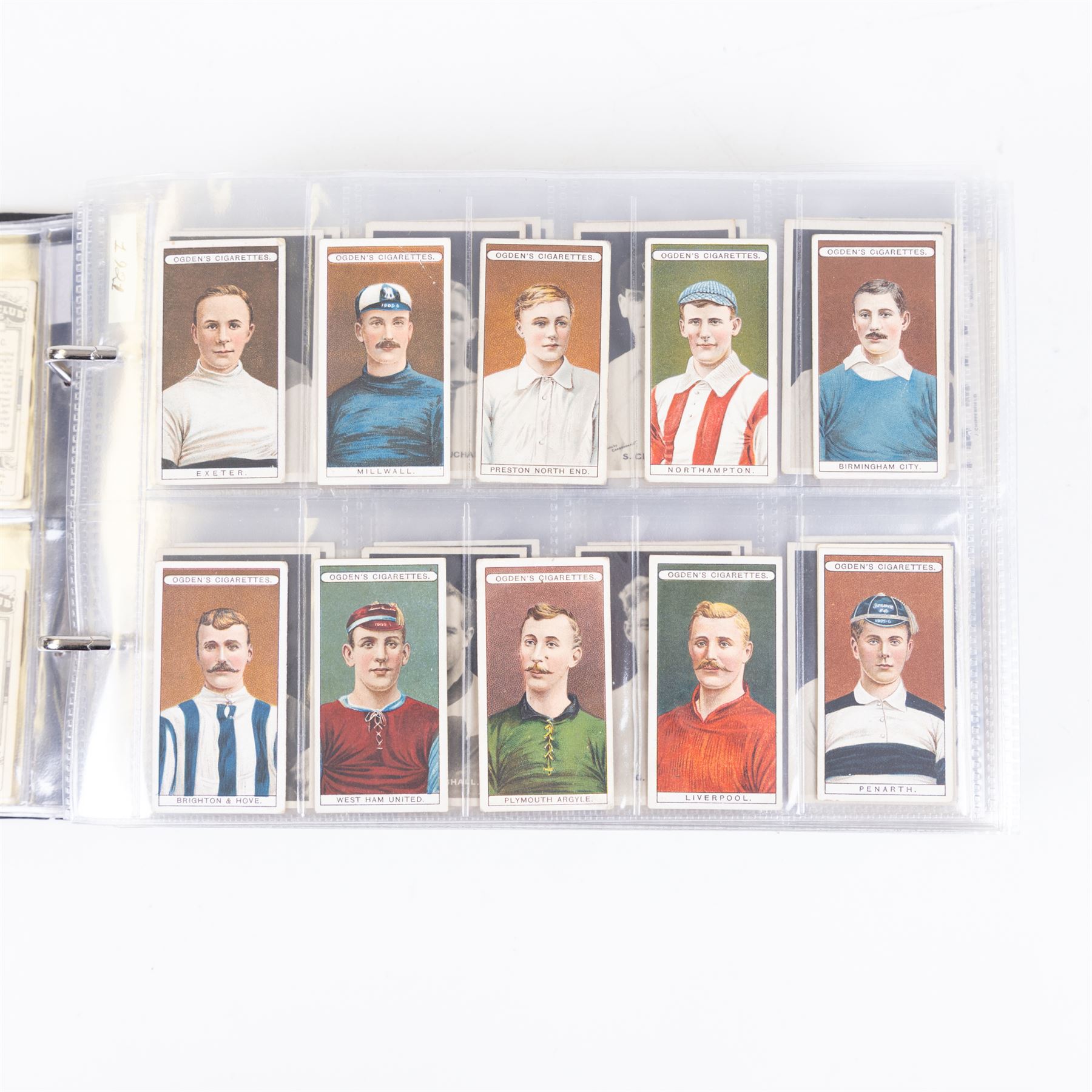 Collection of Edwardian and later Football related trading and cigarette cards, including forty-nine of fifty 1906 Ogden's Football Club Colours, 1922 PALS Footall series, ninety of one hundred 1925 Gallaher Famous Footballers, complete set of forty-four 1926 Ogden's Captains of Association Football Clubs and Colours, complete set of fifty 1927 Players Football Caricatures by MAC,  complete set of fifty 1927 Players Football Caricatures by RIP,  complete set of fifty 1930 Players Association Cup Winners, complete set of 50 1933 Ogdens AFC Nicknames etc, housed in brown cigarette card album