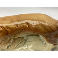 Royal Dux porcelain hunting dog with a bird, printed mark beneath, L36cm