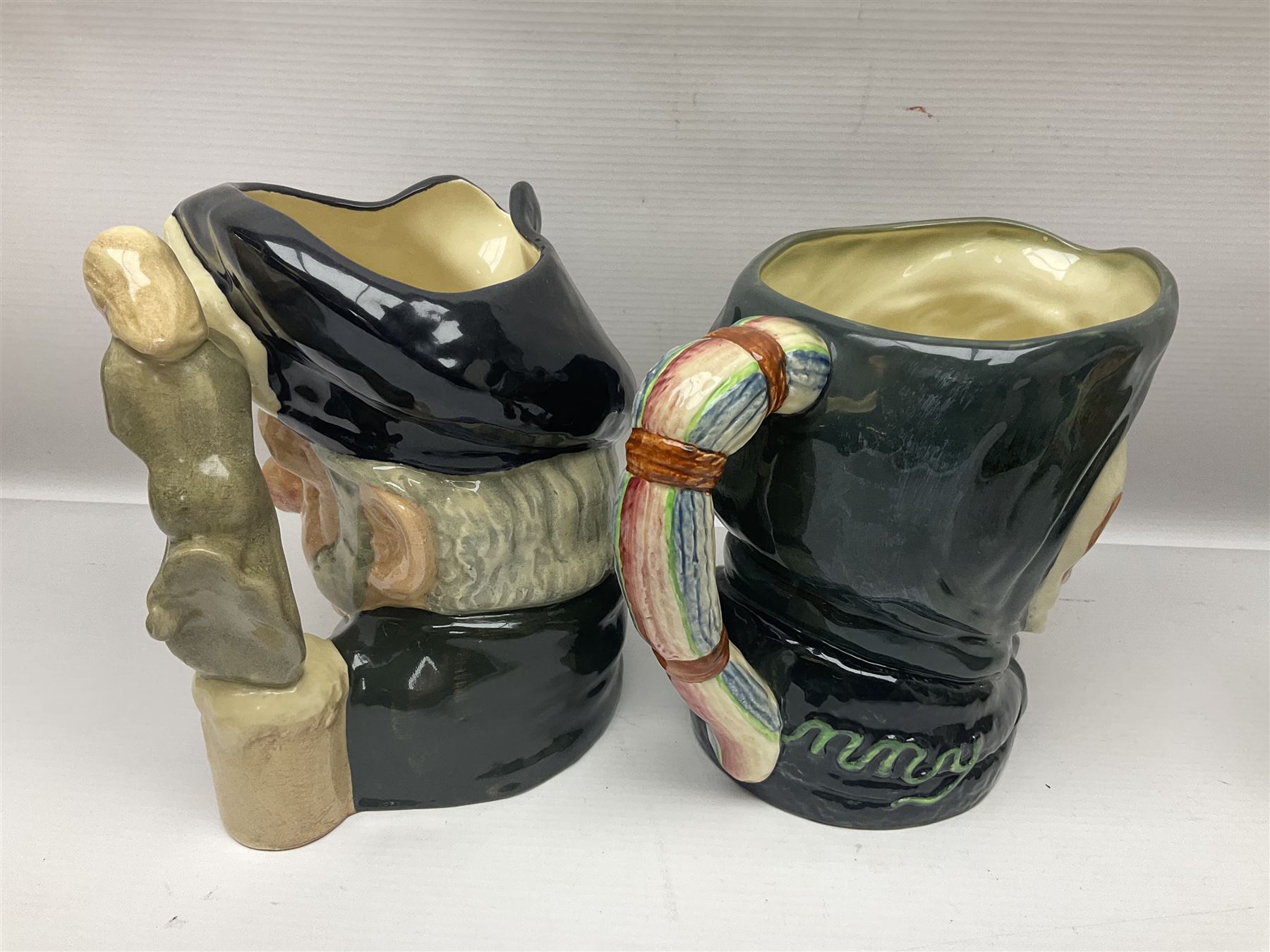 Large collection of Royal Doulton character jugs, to include Robinson Crusoe D6532, Tam O Shanter D6632, The Falconer D6533 etc, together with similar charater jugs and toby jugs   