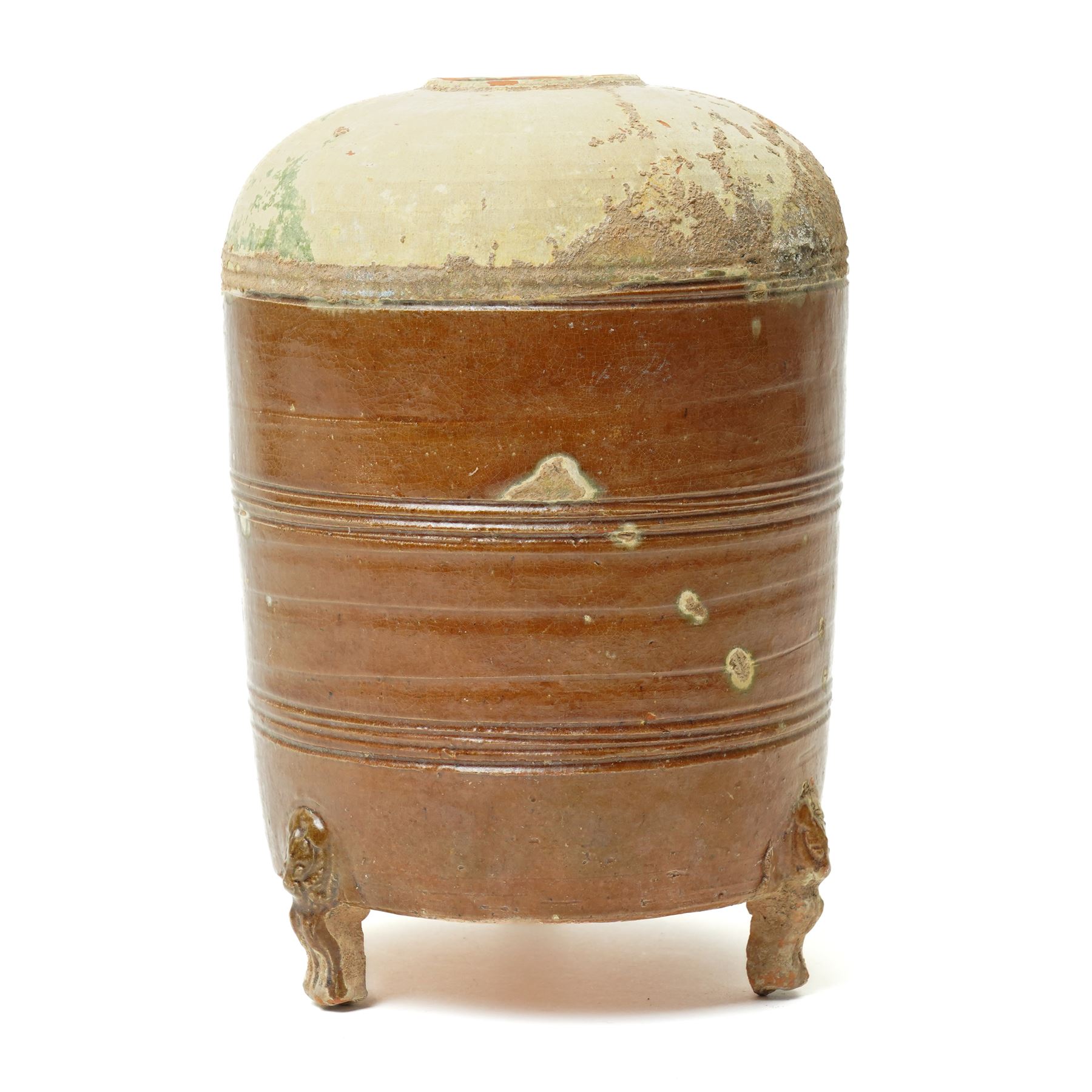 Chinese Han dynasty (202BC-9AD) brown glazed grain store, of cylindrical form, the feet formed as lions,  H26cm