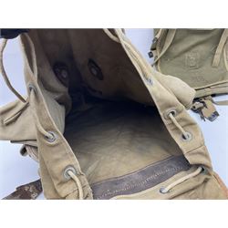 Miscellaneous militaria including WW2 French backpack, leather 'Y' straps, two Yugoslavian army vehicle number plates, US Army aerial, rifle sling, water bottle etc
