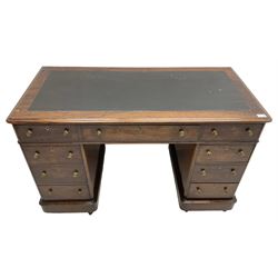 Victorian mahogany twin pedestal desk, rectangular top with inset ebonised leather writing surface, fitted with nine graduating drawers with brass pull handles, on plinth bases